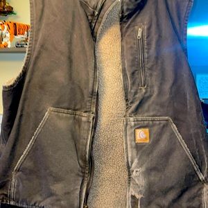 Men’s Carhartt Sherpa lined vest. Has some wear n tear. Make an offer.